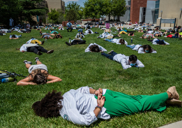  June 4, 2020 University of New Mexico Hospital medical staff and students participate in a die-in...